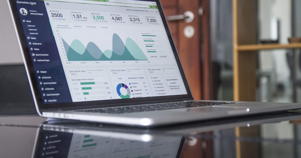 Modern laptop showing website builder comparison, representing the Squarespace vs Wix decision for small businesses